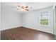 Bedroom with ceiling fan and window at 7813 Sandida Ct, North Charleston, SC 29418