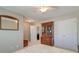 Well-lit bedroom featuring a ceiling fan, wardrobe, carpeted floors, and natural light at 8038 Regency Elm Dr, North Charleston, SC 29406