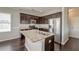 Well-lit kitchen with stainless steel appliances, granite countertops, and plenty of cabinet space at 8038 Regency Elm Dr, North Charleston, SC 29406