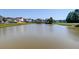 Scenic pond in the backyard adds to the tranquil setting of the property and surrounding homes at 8038 Regency Elm Dr, North Charleston, SC 29406