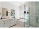 This stylish bathroom features a soaking tub, glass shower, and double sink vanity at 814 Rutledge Ave, Charleston, SC 29403