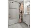 Bathroom with vanity, tub, shower with colorful curtain, and white tile floor at 814 Rutledge Ave, Charleston, SC 29403