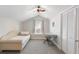 Cozy bedroom under vaulted ceiling features a twin bed and built in desk at 814 Rutledge Ave, Charleston, SC 29403