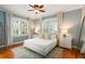 Serene bedroom featuring hardwood floors, natural light, and coordinating décor at 814 Rutledge Ave, Charleston, SC 29403