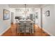 Bright, spacious kitchen with a large island, stainless appliances, and wood floors at 814 Rutledge Ave, Charleston, SC 29403