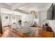 Cozy living room with hardwood floors, comfortable seating, and lots of natural light at 814 Rutledge Ave, Charleston, SC 29403