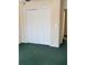 Bedroom featuring bifold closet doors and green carpeting at 8522 Long Meadow Dr, Charleston, SC 29420