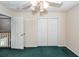Bedroom with closet and door, accented by a ceiling fan at 8522 Long Meadow Dr, Charleston, SC 29420