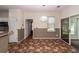 Dining room with sliding glass doors and decorative lighting fixture at 8522 Long Meadow Dr, Charleston, SC 29420