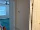 Hallway leading to room with fan, blinds and green carpet at 8522 Long Meadow Dr, Charleston, SC 29420
