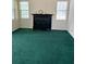 Living room features natural light and a dark fireplace at 8522 Long Meadow Dr, Charleston, SC 29420
