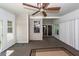 Relaxing sunroom with backyard views and multiple access points at 8522 Long Meadow Dr, Charleston, SC 29420
