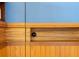 Detailed view of custom cabinetry with wood grain and black hardware at 905 Palm Blvd, Isle of Palms, SC 29451