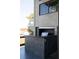 Elegant outdoor kitchen and bar with built-in grill and stone countertop, ideal for entertaining at 905 Palm Blvd, Isle of Palms, SC 29451