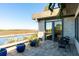 Enjoy outdoor living on this covered patio, overlooking a tranquil river view at 905 Palm Blvd, Isle of Palms, SC 29451