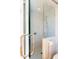 Elegant marble tiled shower features modern fixtures and a glass enclosure, providing a luxurious bathing experience at 905 Palm Blvd, Isle of Palms, SC 29451