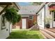 Charming backyard featuring a deck, stairs, lush plants and a fenced area at 95 Gordon St, Charleston, SC 29403