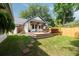 Spacious backyard with a deck, patio, and lush green lawn creating a wonderful outdoor retreat at 95 Gordon St, Charleston, SC 29403