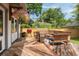 Outdoor deck with built in seating, furniture, and a grill creating an inviting entertaining area at 95 Gordon St, Charleston, SC 29403