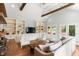 Spacious living room with vaulted ceilings, built-in shelving, and neutral decor at 95 Gordon St, Charleston, SC 29403