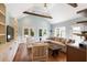 Bright living room featuring high ceilings, exposed beams, and access to the backyard at 95 Gordon St, Charleston, SC 29403