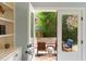 Outdoor patio with a furniture set, open french doors, and ample light creating an inviting lounge area at 95 Gordon St, Charleston, SC 29403