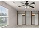 Bedroom featuring custom closet and a large window at 9711 Tackle St, Ladson, SC 29456