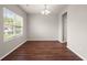 Dining room offers hardwood flooring, natural light, and chandelier at 9711 Tackle St, Ladson, SC 29456