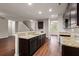 Spacious kitchen and living room with an open floor plan, perfect for entertaining at 9711 Tackle St, Ladson, SC 29456