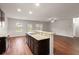 Bright and airy kitchen with stainless steel appliances and eat-in breakfast bar at 9711 Tackle St, Ladson, SC 29456