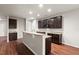 Beautiful kitchen with granite countertops, dark wood cabinetry and plenty of storage at 9711 Tackle St, Ladson, SC 29456
