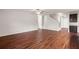 Bright living room featuring hardwood floors, ceiling fan, and an open floorplan at 9711 Tackle St, Ladson, SC 29456