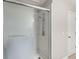 Bathroom shower with glass doors and chrome fixtures at 9711 Tackle St, Ladson, SC 29456