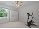 Simple, tidy bedroom with a ceiling fan, window with a view, and wardrobe for storage at 1004 Saltwater Cir, Johns Island, SC 29455