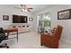 Comfortable bedroom featuring neutral walls, carpet, and a large window with exterior views at 1004 Saltwater Cir, Johns Island, SC 29455