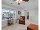 Bonus room featuring chair and bookshelf with natural light from large windows at 1004 Saltwater Cir, Johns Island, SC 29455