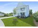 Charming two-story home with a well-manicured lawn and inviting curb appeal at 1004 Saltwater Cir, Johns Island, SC 29455