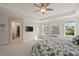 Bright main bedroom with trey ceiling, ensuite bathroom, and walk-in closet at 1004 Saltwater Cir, Johns Island, SC 29455