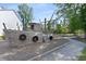 Unique wooden playground structure in a fenced backyard setting at 1004 Saltwater Cir, Johns Island, SC 29455