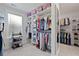 Spacious walk-in closet with custom shelving and ample storage space for clothes and accessories at 1004 Saltwater Cir, Johns Island, SC 29455