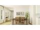 Bright dining room featuring a wood table, seating for six, and a decorative gallery wall, creating an inviting space at 1019 Sagegrass St, Summerville, SC 29485