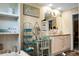 A well-decorated bathroom vanity area with stylish decor, storage, and a double sink at 1051 Cooper Store Rd, Moncks Corner, SC 29461