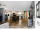 Inviting living room leading to a modern kitchen with stainless steel appliances and a stylish island for dining at 1051 Cooper Store Rd, Moncks Corner, SC 29461