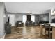Spacious living room with wood-look floors, and decor accents for a cozy feel at 1051 Cooper Store Rd, Moncks Corner, SC 29461
