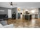 Open-concept living room and kitchen featuring modern appliances, a stylish island, and a comfortable seating area at 1051 Cooper Store Rd, Moncks Corner, SC 29461