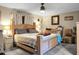 Serene main bedroom featuring a large bed with nightstands and ample natural light at 1051 Cooper Store Rd, Moncks Corner, SC 29461