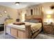 Comfortable main bedroom with a large bed, ceiling fan, and natural light at 1051 Cooper Store Rd, Moncks Corner, SC 29461