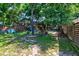 Expansive backyard with play set and multiple seating areas, perfect for Gathering fun and entertaining at 1076 Hatfield St, North Charleston, SC 29405