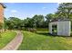 Lush backyard featuring a gazebo and scenic lake views at 108 Woodlake Dr, Summerville, SC 29485