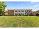 Spacious home with brick accents, a well-manicured lawn, and attractive landscaping at 108 Woodlake Dr, Summerville, SC 29485